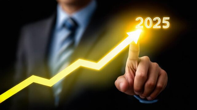 Businessman pointing at growth projection for 2025 on a dark background.