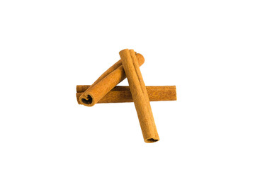 Variety of cinnamon bark segments on a white backdrop, highlighting their natural imperfections and forms.