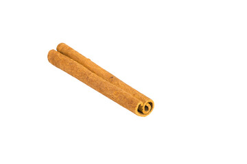 Variety of dried cinnamon bark pieces displayed on white, highlighting their unique forms and...