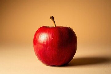 Crimson Apple on Beige Surface