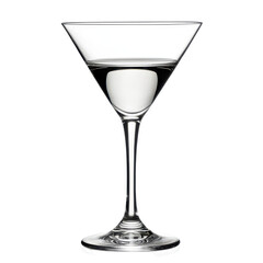 Elegant cocktail glass filled with clear liquid on a simple backdrop under soft lighting in an indoor setting