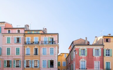 Fototapeta premium summer, Nice, France ,French Riviera, Colorful French Townhouses Under Sunny Sky