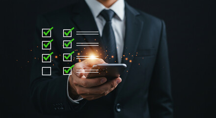 A man in a suit holding a phone with green checkmarks and lines floating around it on a dark background
