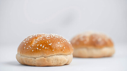 classic burger bun with sesame seeds, soft and fluffy, ready for a delicious meal.