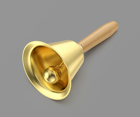 Golden bell with a wooden handle on a grey background