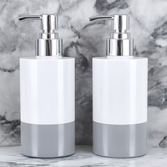 Obraz premium Elegant matching liquid soap dispensers against a textured marble backdrop