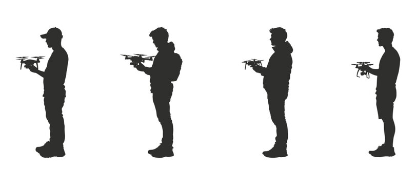 Men operating drones professional silhouettes showcasing technology aerial photography remote control devices