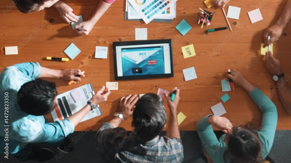 Poster top view of skilled business people working together to design web design. aerial view of designer b