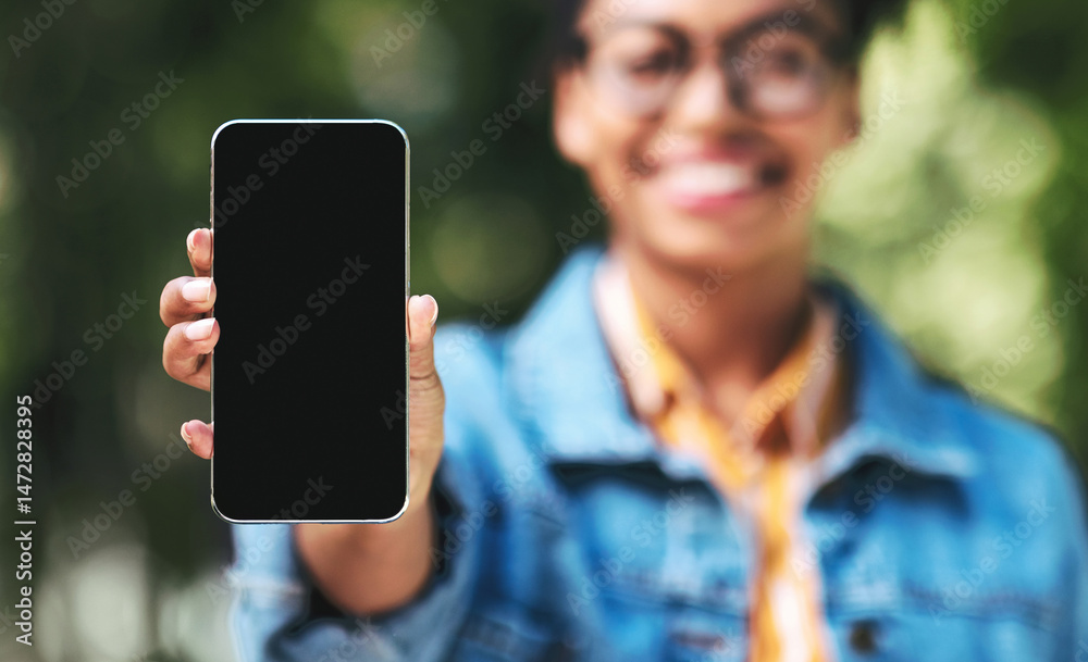Poster unrecognizable black woman showing cellphone empty screen recommending application standing outdside