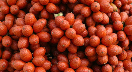 Close Up Of Buriti Fruits With Their Distinctive Brownish Red Color
