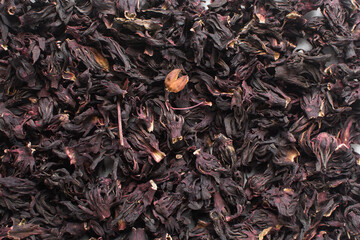 Overhead view of dried roselle, top view of dried hibiscus and Sorrel flowers, ingredient for...