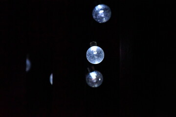 White Decorative Lights with Black Background
