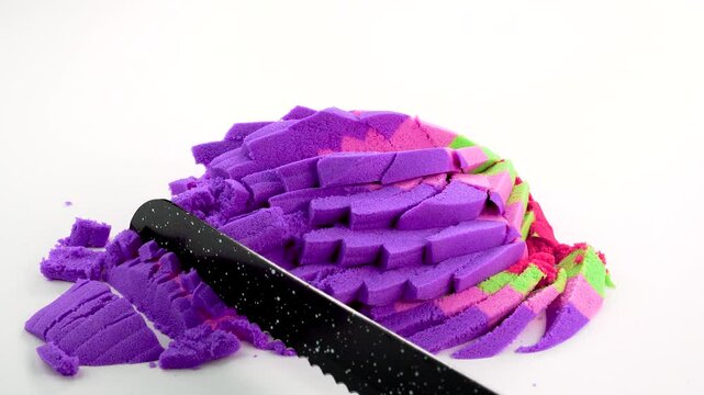 Very Satisfying and Relaxing Kinetic Sand ASMR video. Cutting anti stress macro close up colorful Kinetic Sand with a Knife. ASMR sounds.
