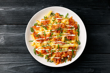 Loaded Kimchi Fries with cheese, mayonnaise and spring onion