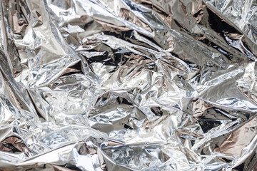 Crumpled Silver Foil Background – Shiny Metallic Party Decoration Texture