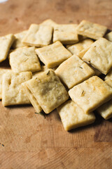 Overhead view of homemade crackers, top view of freshly baked cracker biscuits, process of making crackers
