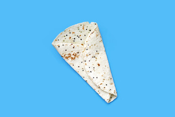 Quinoa tortilla wraps on blue background