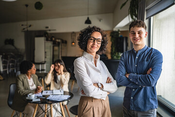 portrait of caucasian businesswoman and businessman in the office
