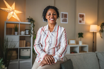 Portrait of beautiful mature african american woman in the living room