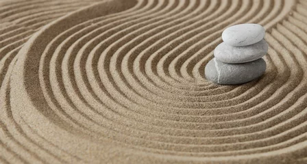 Fotobehang Zen Stenen Japanese zen garden meditation, stone background with stones and lines in the sand for relaxation balance and harmony spirituality or wellness spa, calm pastel beige color, zen stones.  © Joanna