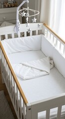 A serene, white baby crib with a hanging star mobile creates a calm and inviting space for a little one to rest and dream peacefully.