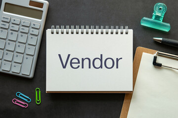 There is notebook with the word Vendor. It is as an eye-catching image.