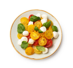 Fresh salad with yellow tomatoes, basil and mozzarella cheese isolated on white, top view