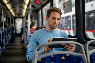Man using tablet on public transport commuting urban city bus day work on transparent background