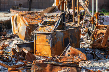 Fototapeta premium burned debris at home destroyed in the Altadena wildfires on Loma Alta Drive in Altadena California USA