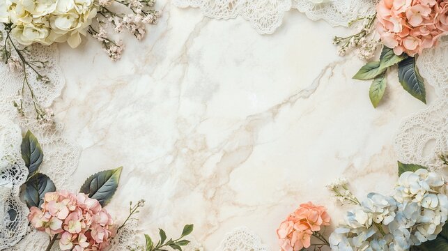 Flat lay of pastel hydrangeas and lace on marble.