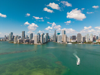Naklejka premium City skyline. Miami from Brickell Key in Florida. Skyscraper in downtown city. Cityscape skyline. Brickell building in Miami downtown. Brickell skyline with skyscraper architecture. Luxury life