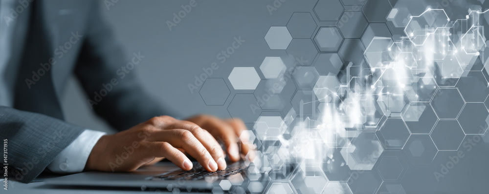 Poster A businessman's hands typing on a laptop keyboard, with a futuristic digital network interface overlay.  The image conveys concepts of technology, innovation, and connectivity. : Generative AI
