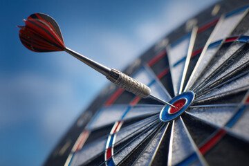 Close-up of a dart hitting the bullseye on a dartboard against a bright blue sky, symbolizing accuracy and achieving goals. : Generative AI
