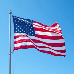 Obraz premium American flag waving proudly against a clear blue sky, a symbol of freedom and patriotism. The United States flag, a national emblem representing democracy and unity.