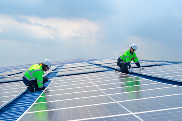 Engineer team installs solar cells check installation solar cell on the roof Sustainable energy industry concept Renewable energy solutions for climate change