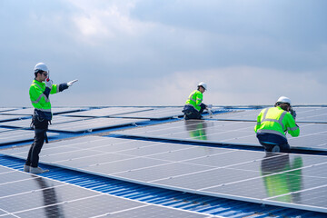 Engineer team installs solar cells check installation solar cell on the roof Sustainable energy industry concept Renewable energy solutions for climate change