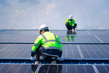 Engineer team installs solar cells check installation solar cell on the roof Sustainable energy industry concept Renewable energy solutions for climate change..