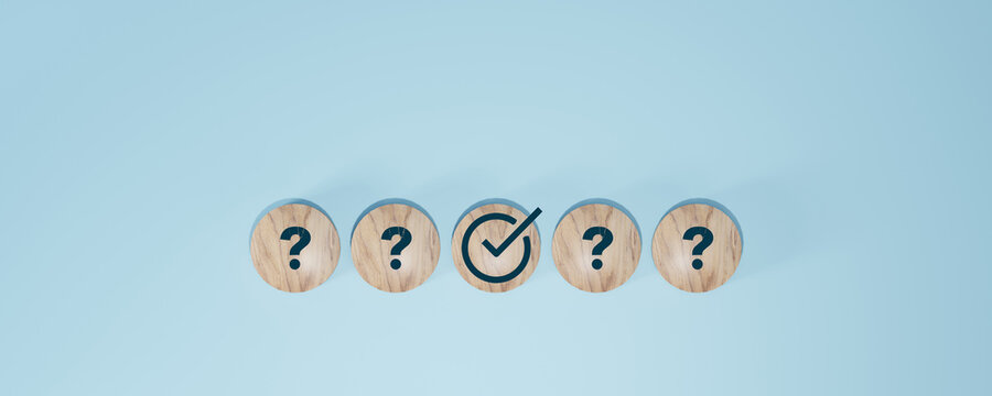 Questions and a check mark on the wooden with words. many questions and one answer. - Powered by Adobe