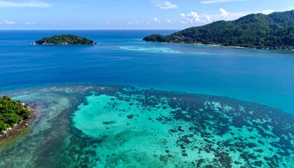 Fototapeta premium Tropical islands with lush greenery amid clear blue waters and coral reefs