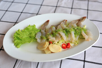 Raw fresh shrimp with fish sauce spicy, salty and sour seafood thailand.