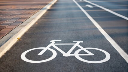 Fototapeta premium Bicycle lane marking on a city street with clear visibility.