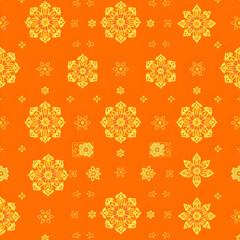 Traditional Chinese gold floral fabric pattern on amber orange background.