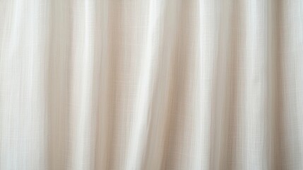Obraz premium Light beige textured fabric curtain with vertical folds and soft natural lighting.