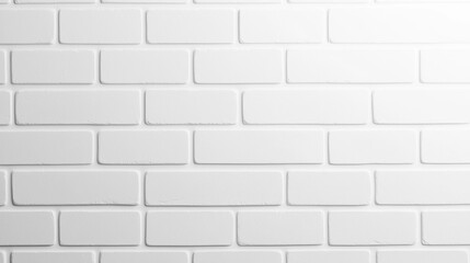 A clean, white brick wall with a smooth finish and uniform pattern, ideal for modern interiors or minimalist backgrounds.