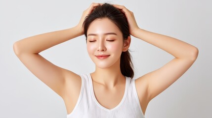 Fototapeta premium Woman contemplating with hands on head, a portrait of thought and reflection
