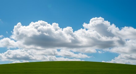 Fototapeta premium Beautiful Blue Sky with White Clouds Above Green Rolling Hill Landscape, Summer Nature