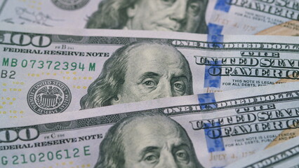 A CloseUp View of U.S. One Hundred Dollar Bills for Detailed Examination and Analysis