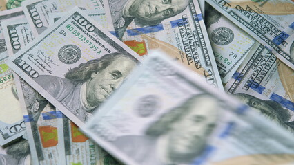 A Tower of Stacked U.S. Dollar Bills Representing Various Financial Concepts and Ideas