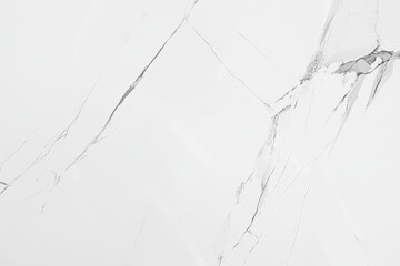 Close-up of a white marble-like surface, featuring subtle gray veins