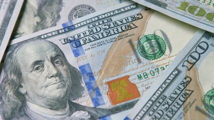 A Detailed CloseUp View of American Dollar Bills Displayed in Various Denominations Available